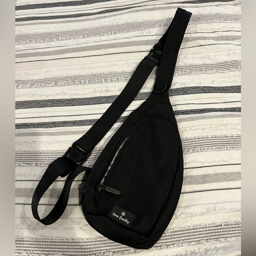 Vera Bradley, black crossbody with silver flora long, zipper on front